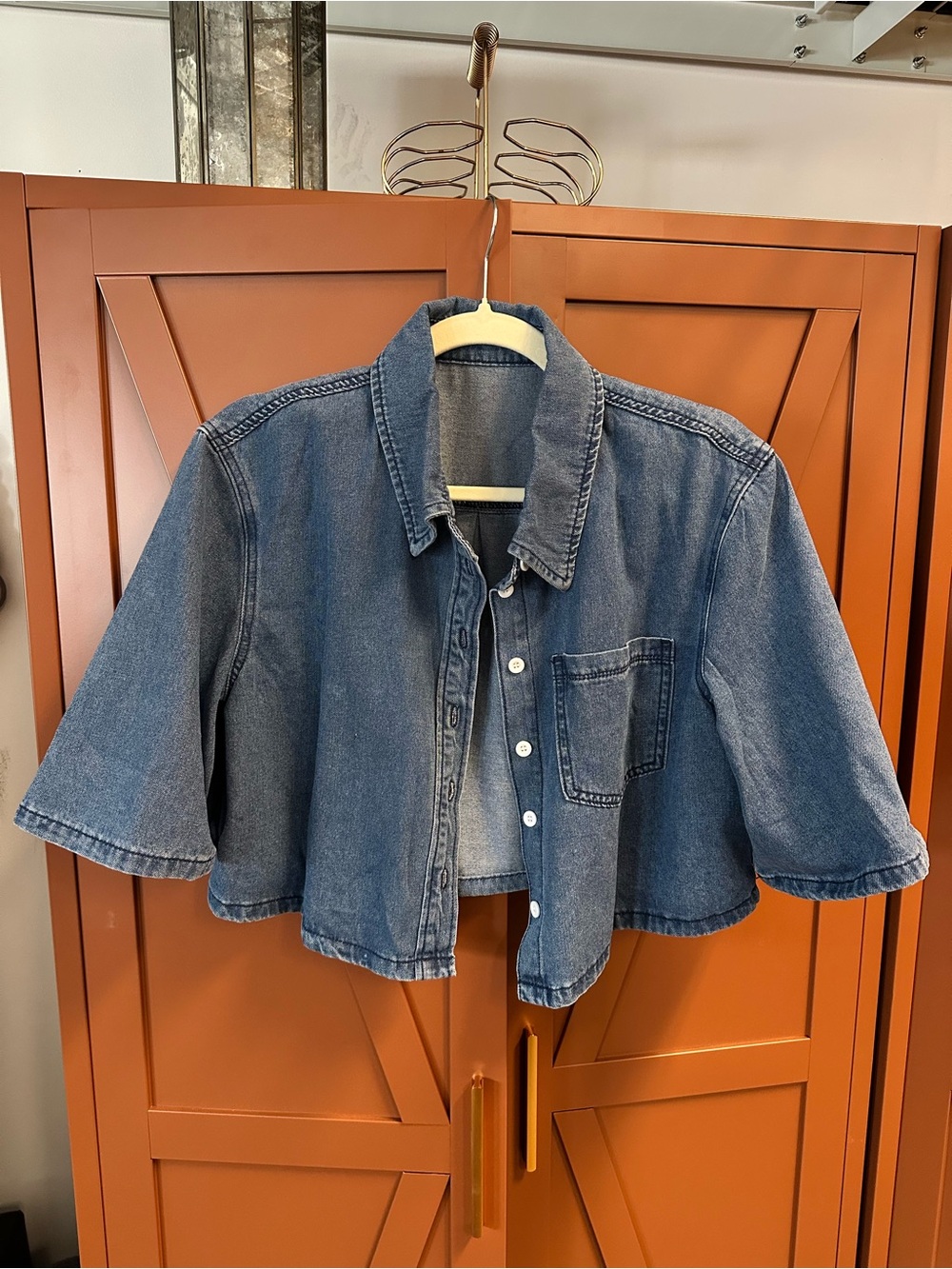 Cropped Denim Short Sleeve Button-Up Jacket in Washed Blue